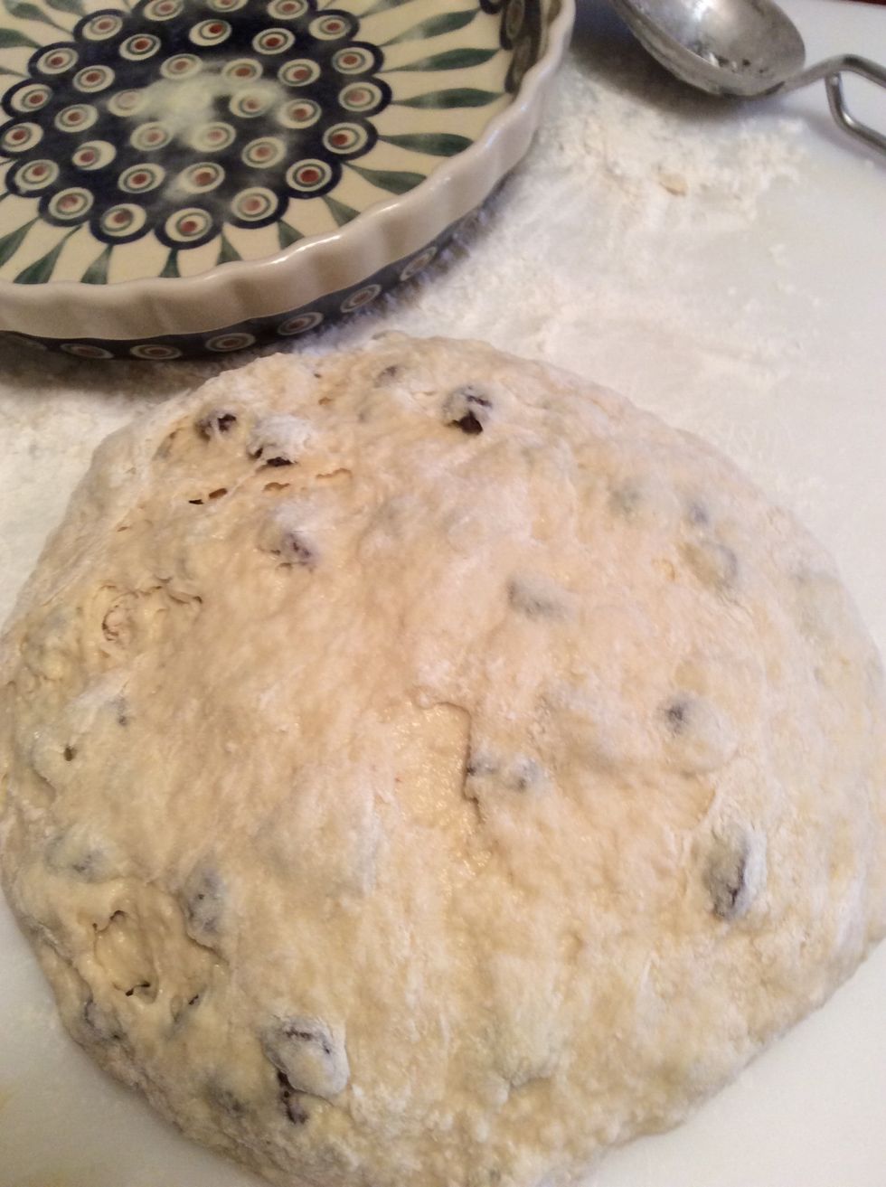 Floured dough shaped ball.