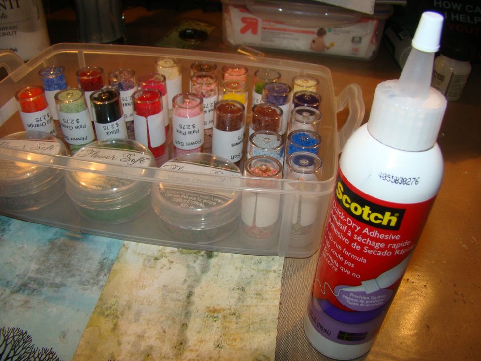 Flower Soft actually makes there own glue, but mine was dried up so this Scotch Quick Dry worked fine.