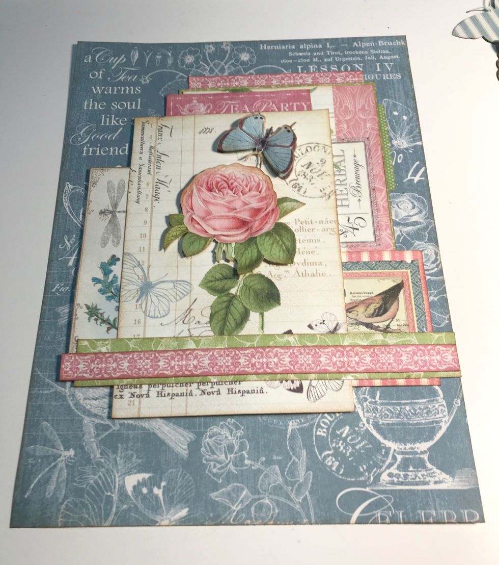 Foam square butterfly & rose over top of image. Adhere long pink border 1/8" from bottom of green/white border. Adhere green/white border 2" from bottom of paper and all the way to right of paper.
