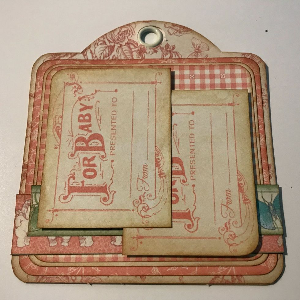 Foam square on of the For Baby tags 3/8" from the bottom & 3/8" from the right of the tag. Foam square the other For Baby tag 7/8" from the bottom & 3/8" from the left of the tag.