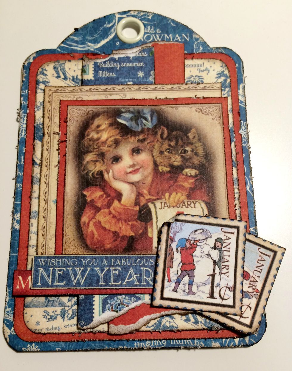 Foam square one postage stamp to the bottom right hand corner. Adhere the second postage stamp slightly overtop of the first stamp. Roll the corners down and up on the postage stamps.