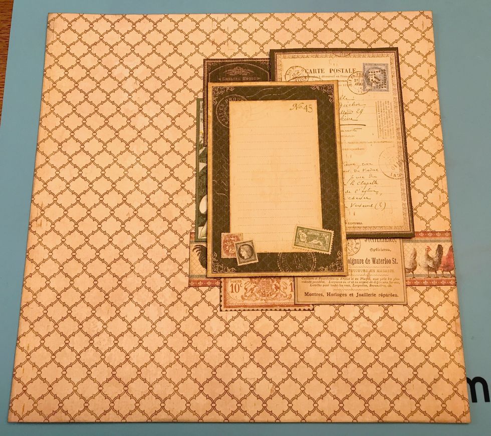 Foam square the postale 4x6 card 1 1/8" from the right and a 1 1/4" from the top of the lattice paper. Foam square the No.45 card 2 3/8" from the top and 3" from the right of the lattice paper.