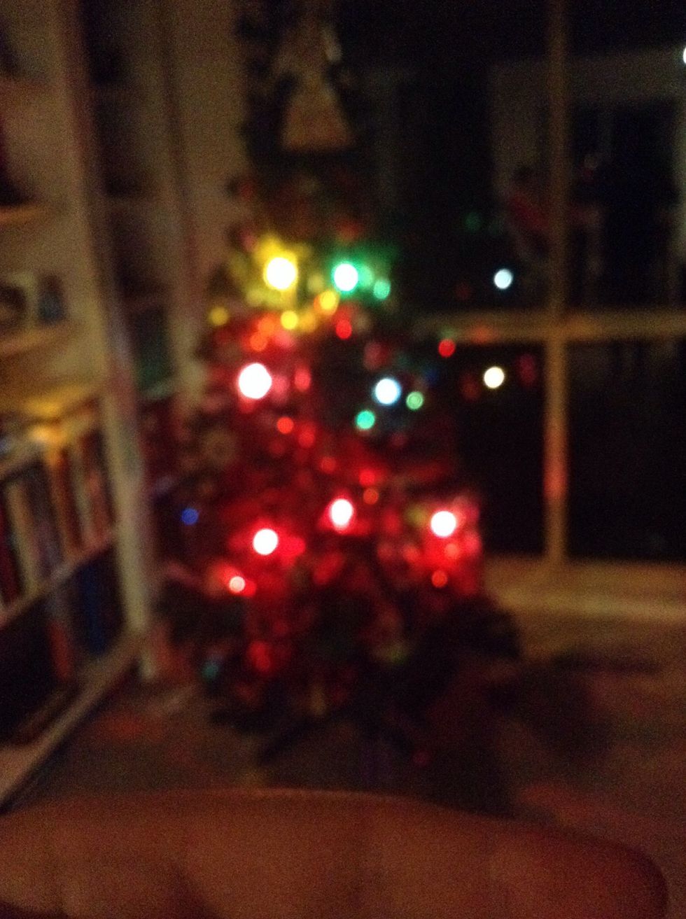 Focus on your hand so the lights go blurry