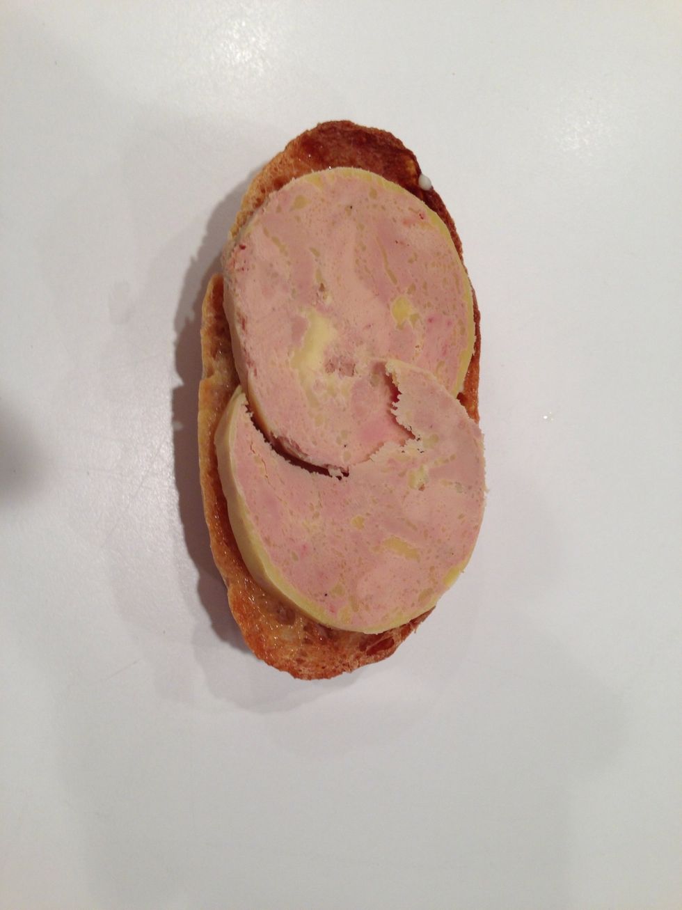 Foie gras is a good thing to put on this bread. After you butter it. It covers the holes nicely.