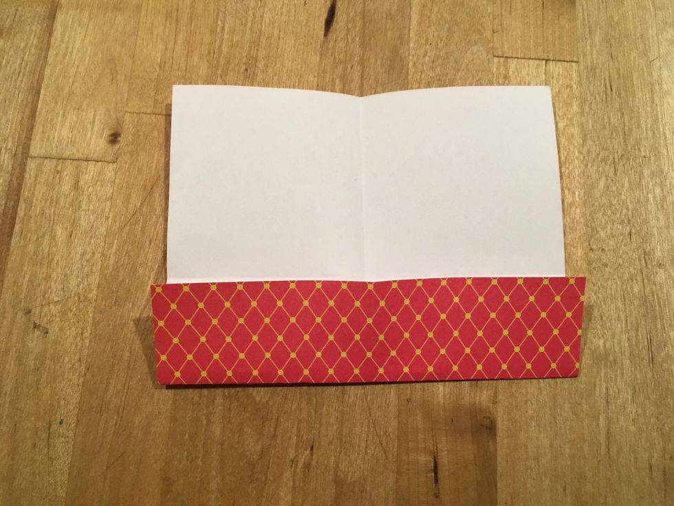 Fold 1/4 of the paper to the line so some of it's colored.