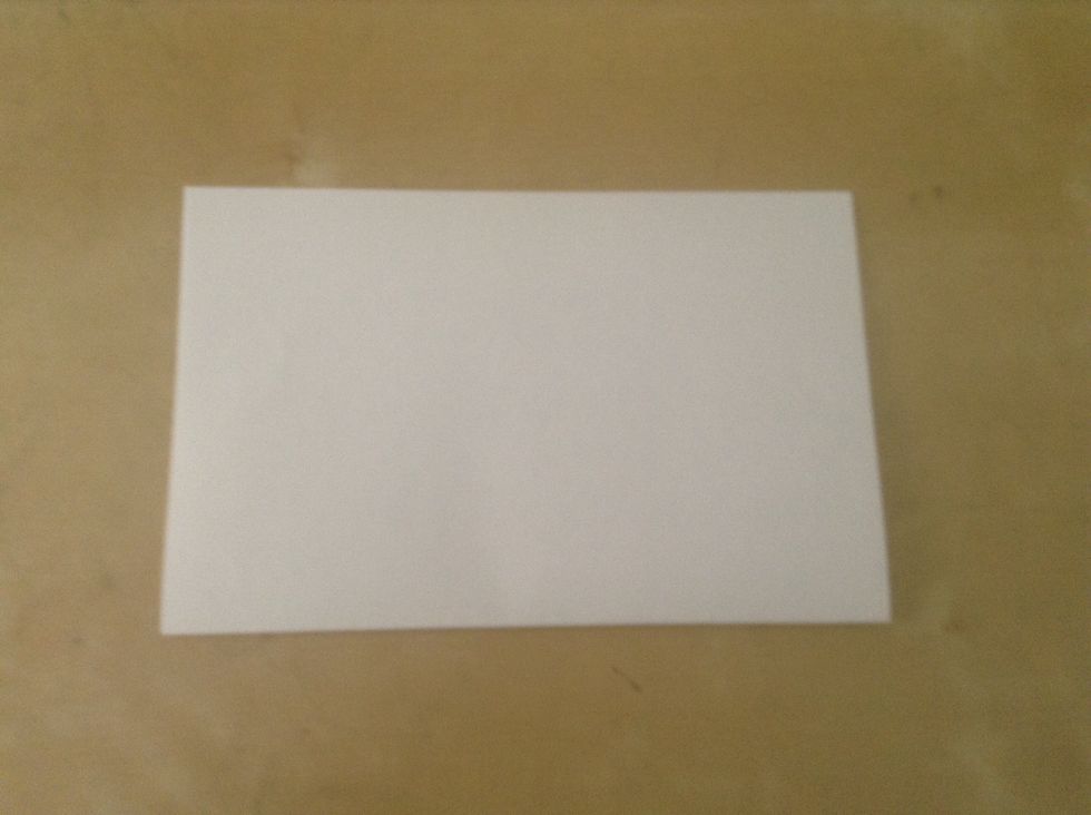 Fold 1 paper in half