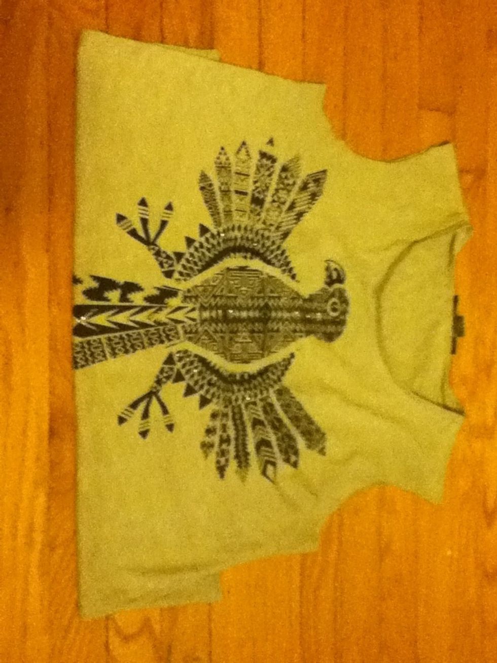 Fold a bit of the shirt underneath . *if its a high low shirt fold up higher.