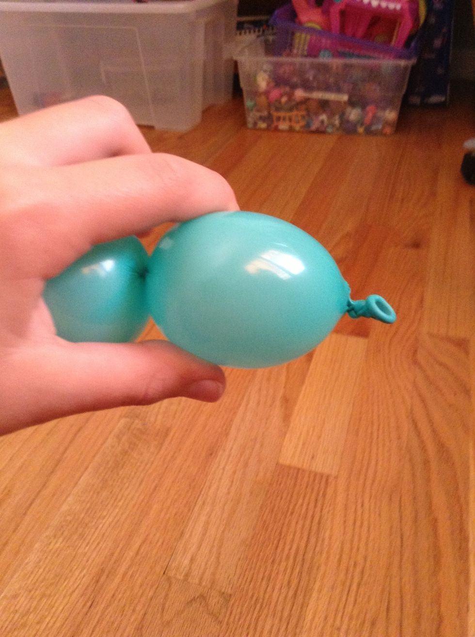 Fold a "bubble" that is about one or two inches, this will be the nose