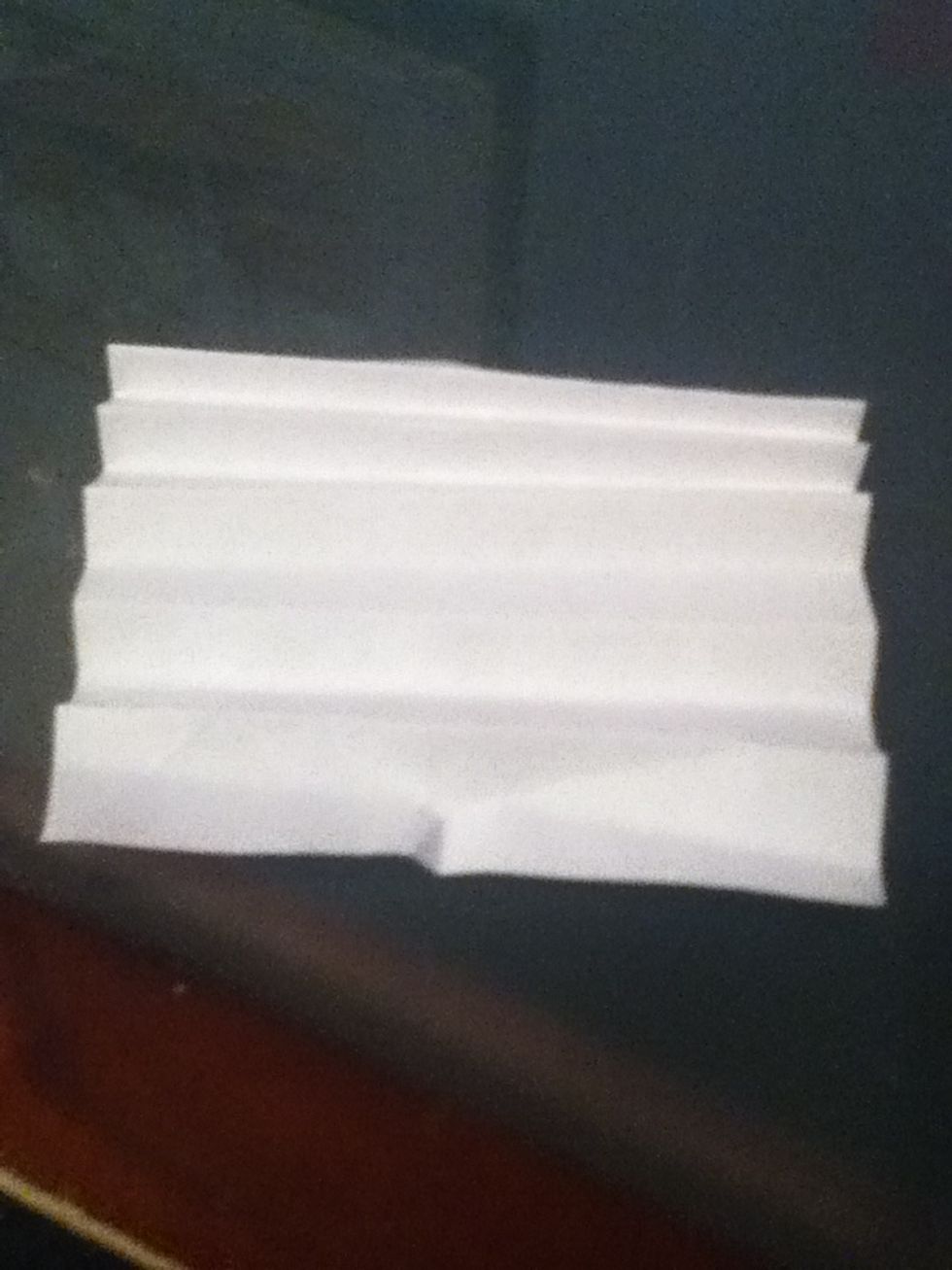 Fold a square paper like a paper fan