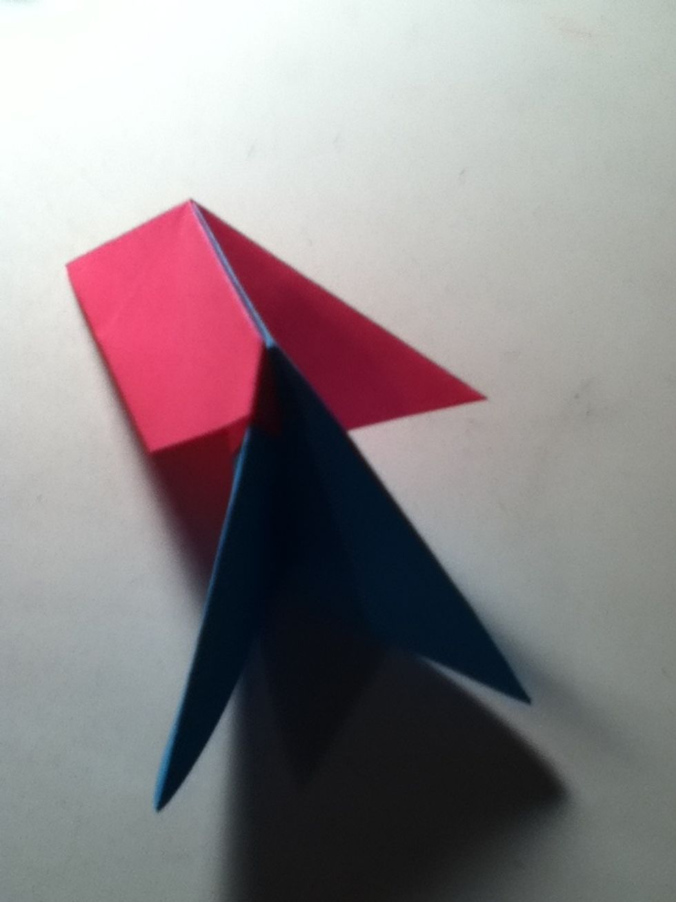Fold a tip into the arrow points