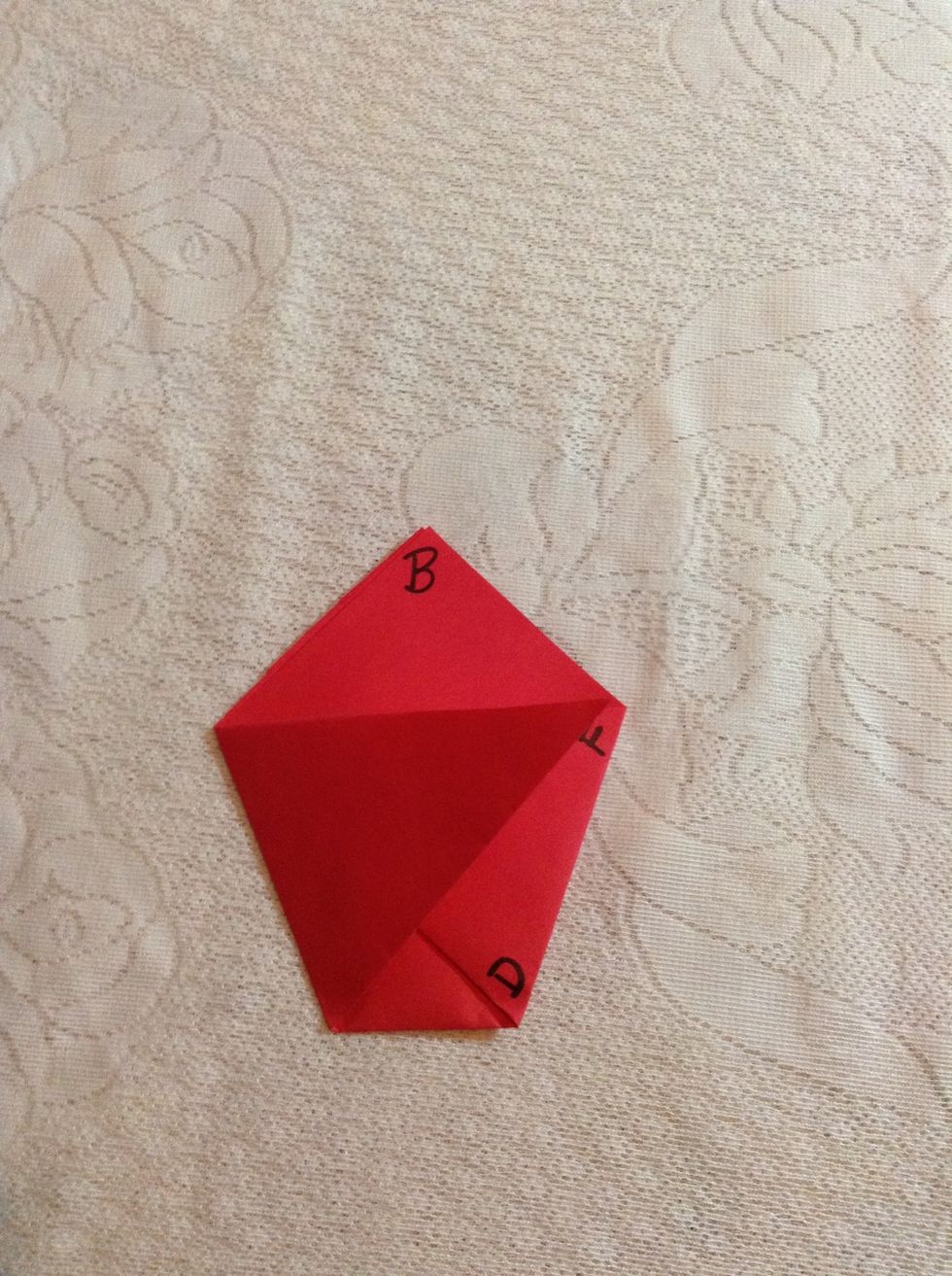 Fold A to point F. You should now see four triangles. If not, go back two steps.