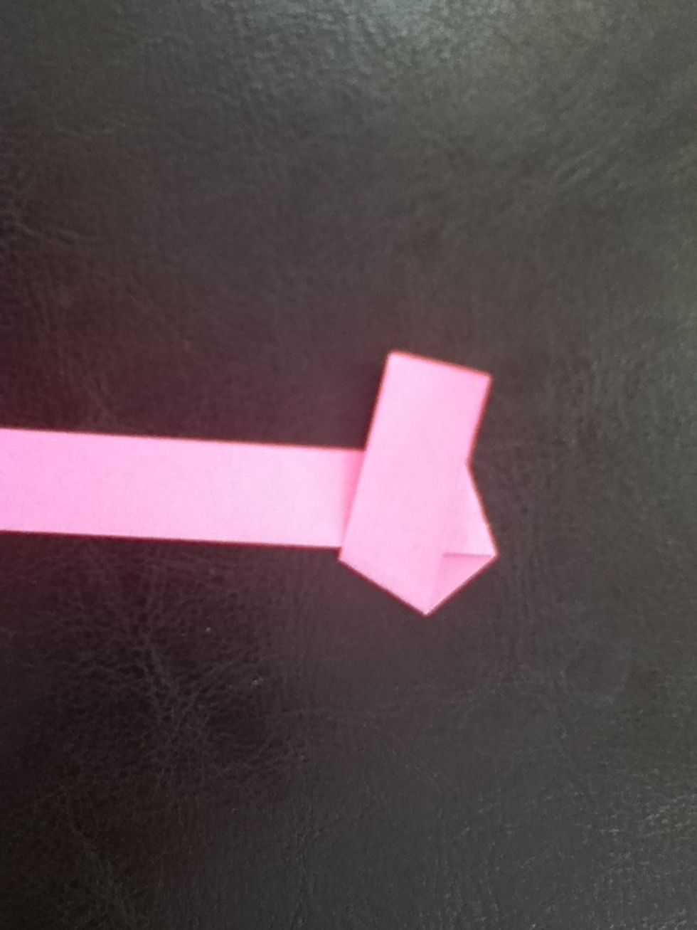 Fold again. You will be creating a pentagon, so adjust the angles accordingly.