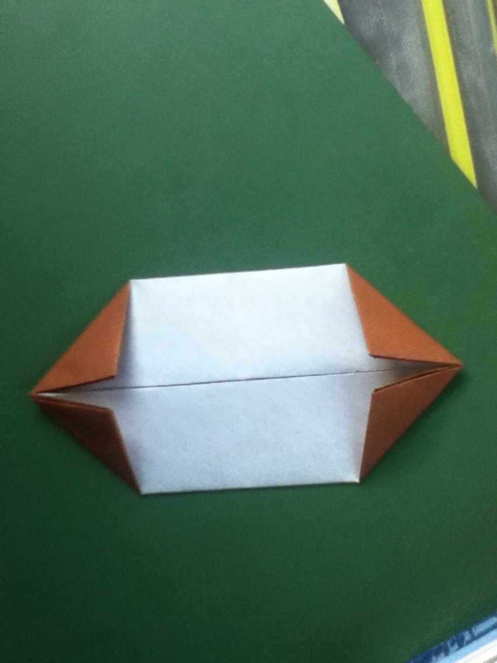 Fold all four corners to the center line