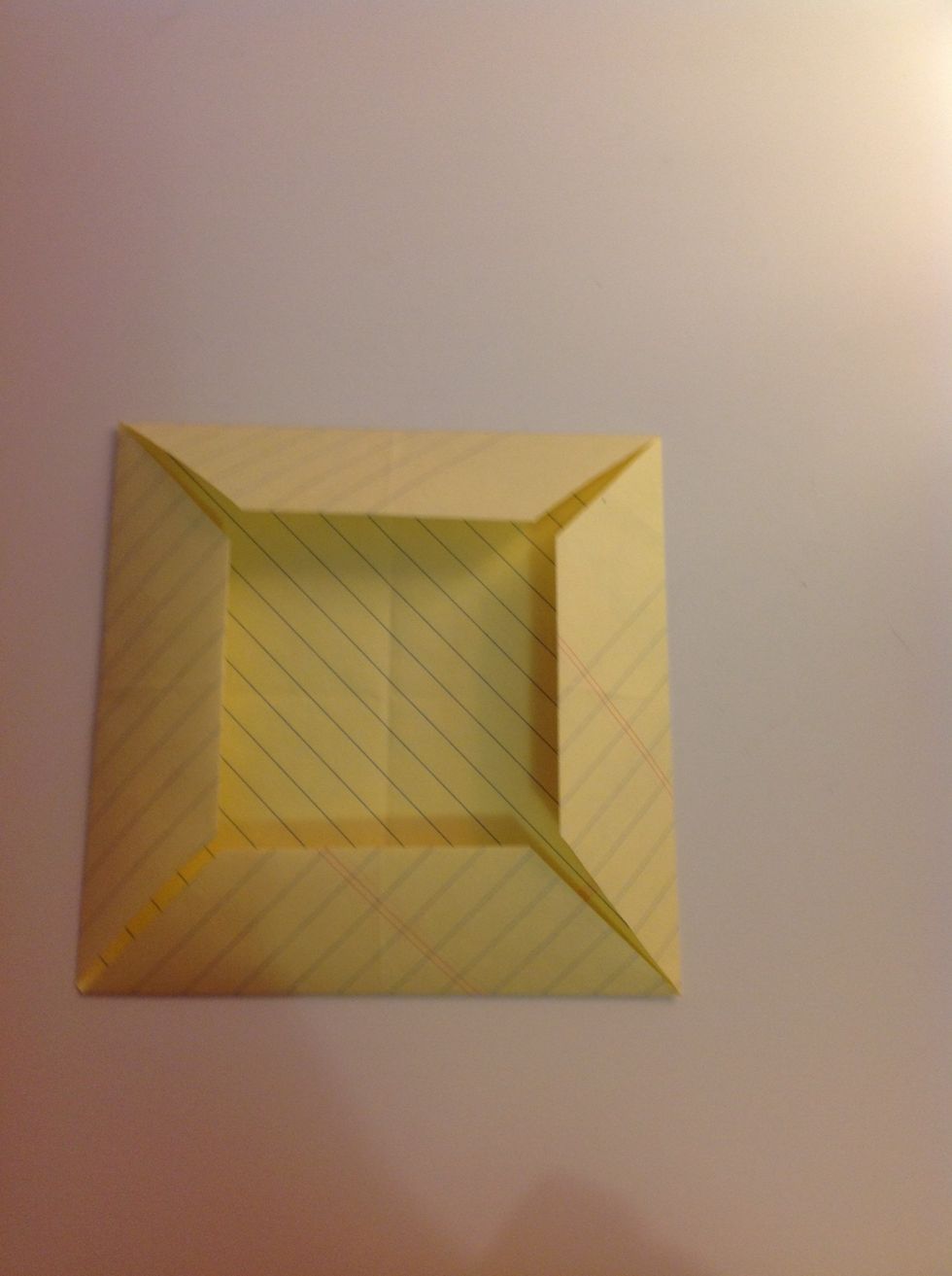 Fold all four sides in.