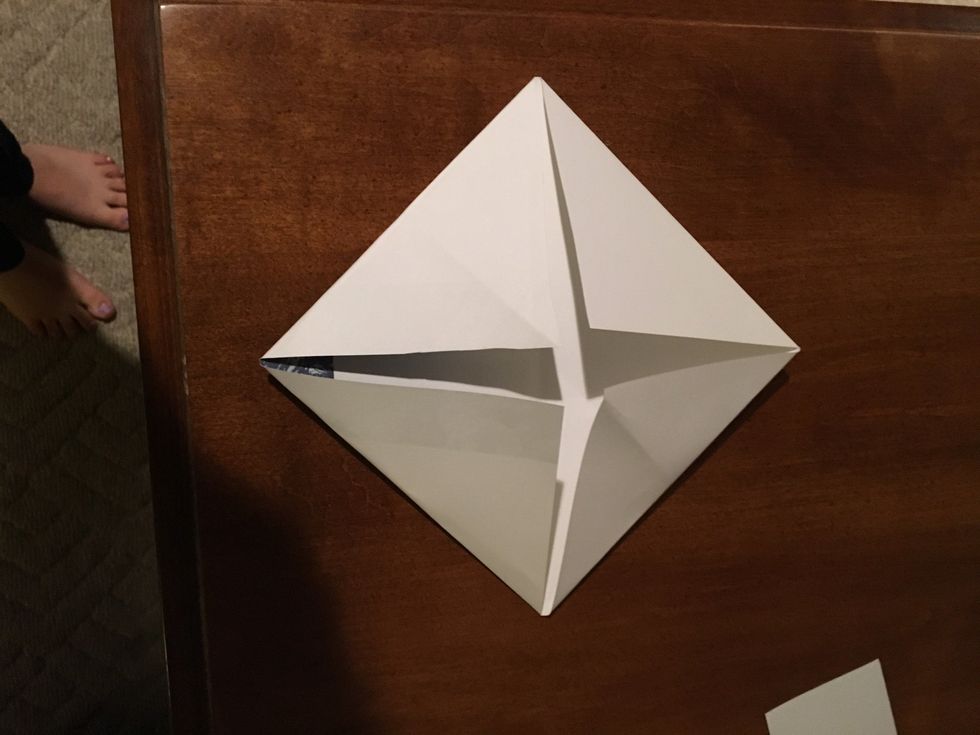 Fold all the corners in