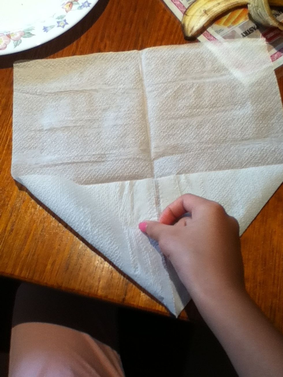 Fold all the corners inwards.