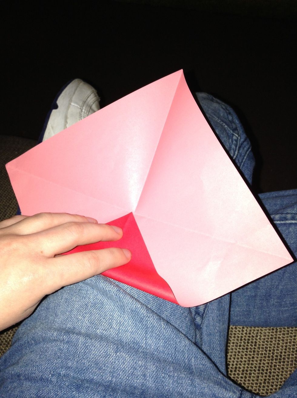 Fold all the corners to the middle
