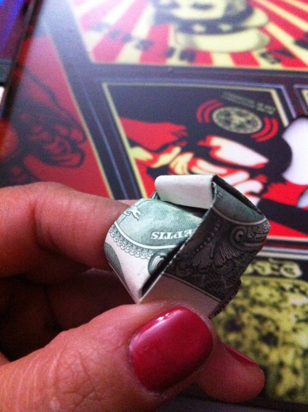 Fold all the way inside the tunnel.