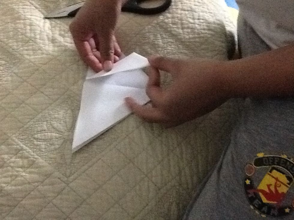 Fold along all the four leafs