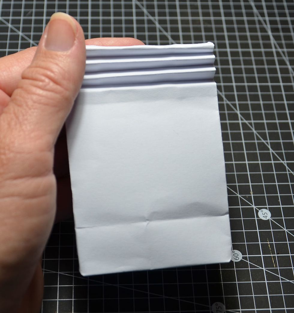 Fold along the fold lines again.