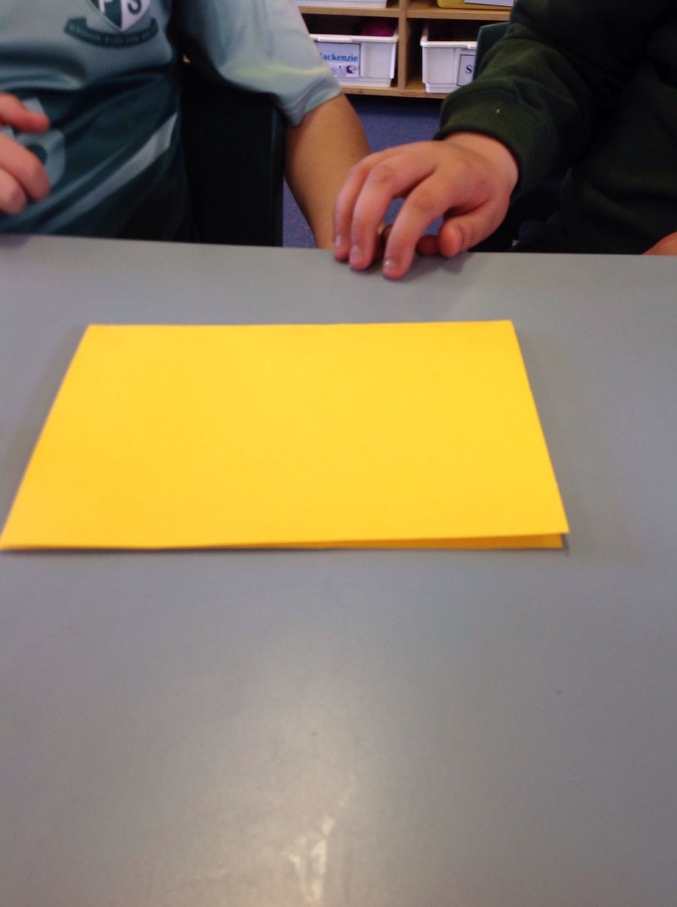 Fold an A4 piece of card board in half