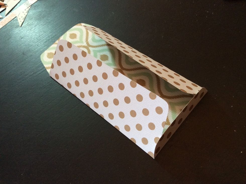 Fold and adhere envelope together.