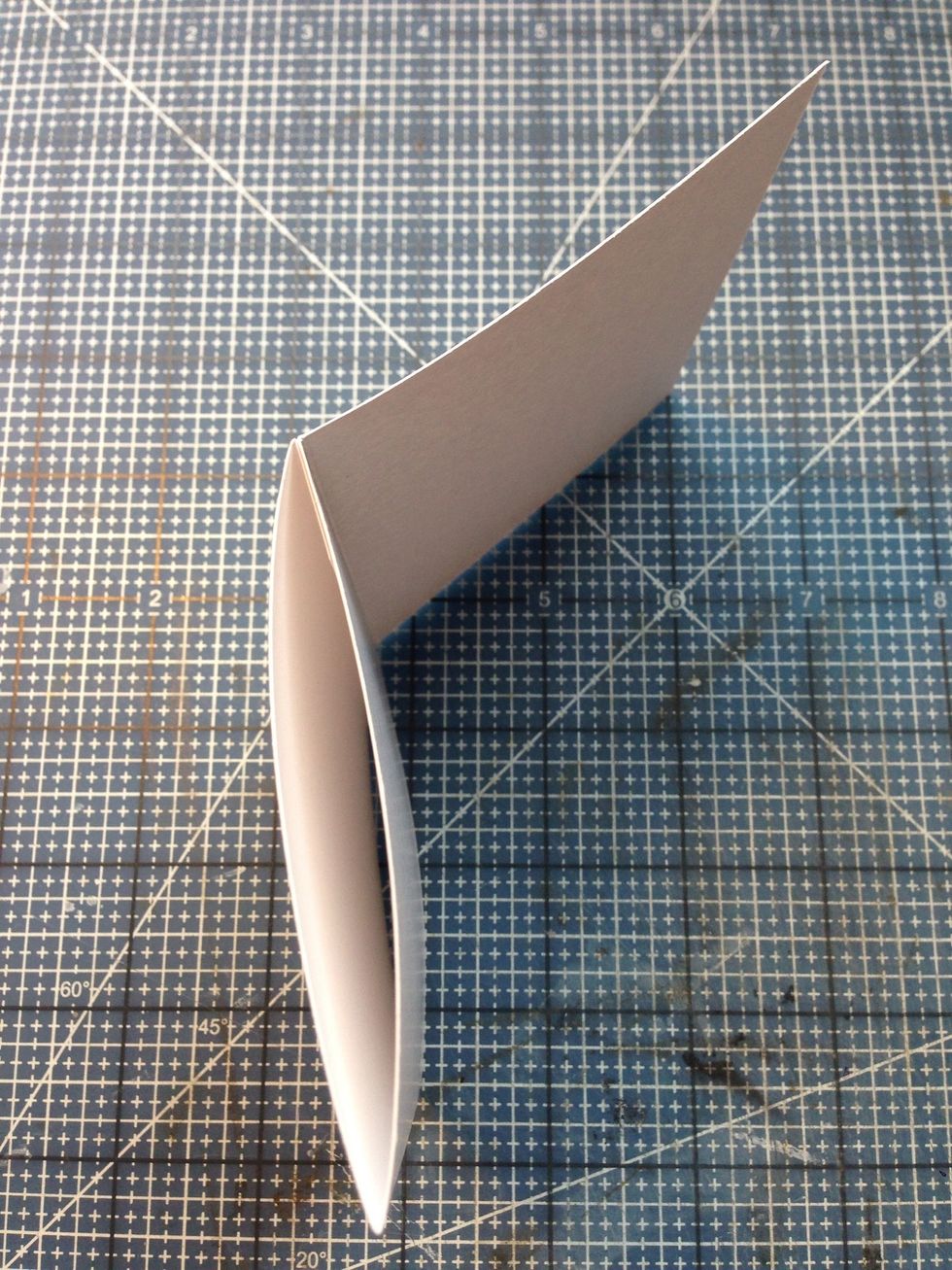 Fold and attach tab to create a 3 1/4" sleeve with a 3" flap.