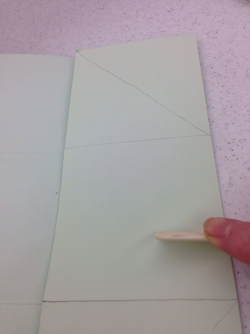 Fold and crease along each scored line.
