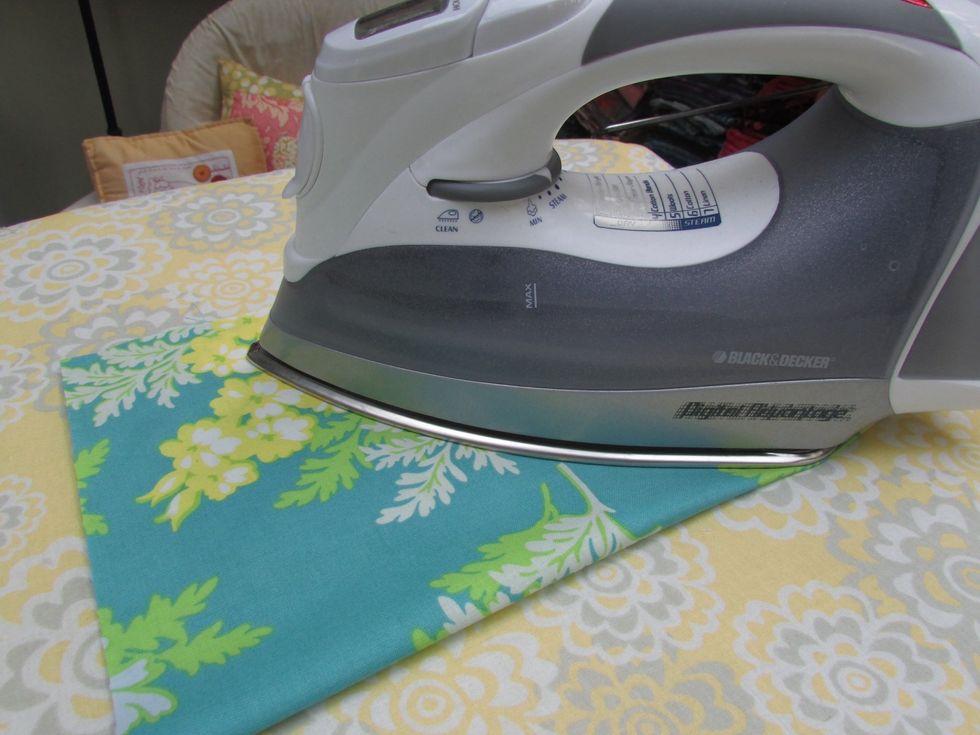 Fold and press the pocket using a steam iron.