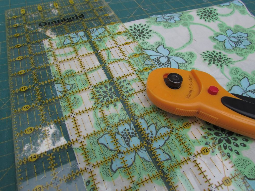 Fold and press your contrast edging fabric, cutting two strips cross grain, 2 1/8" x 42".