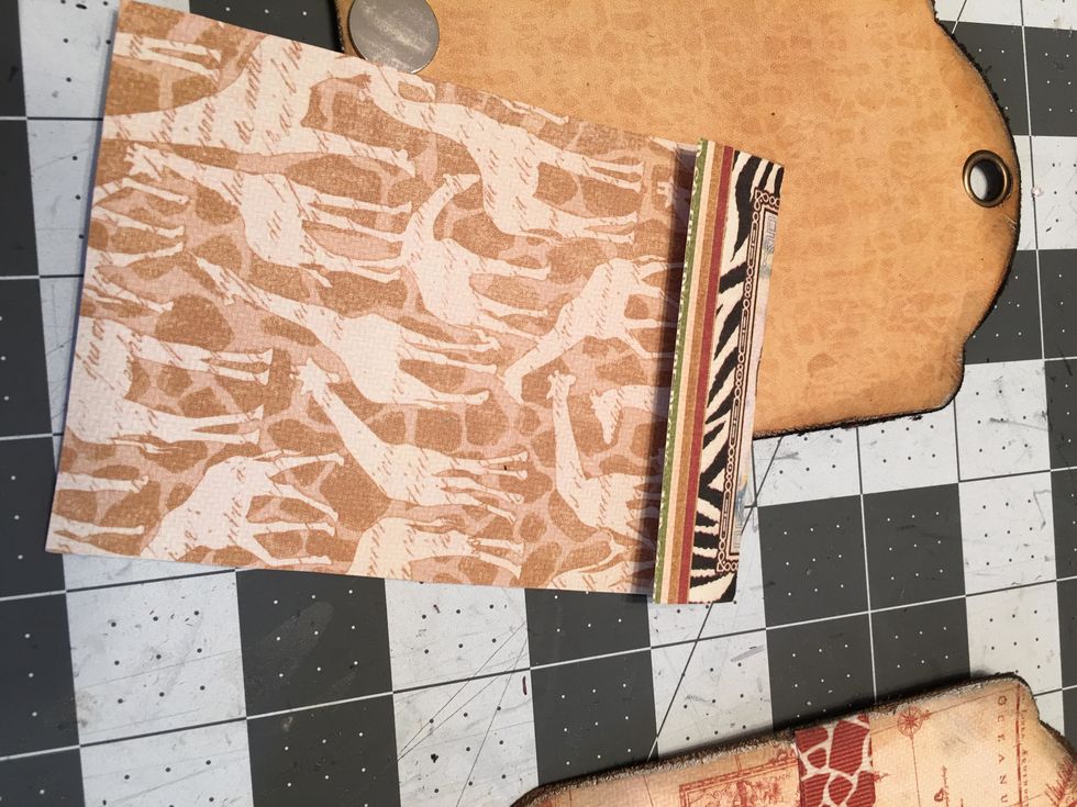 Fold and score the bottom edge about 1/2" to 3/4" as shown on the back side of the cut apart.