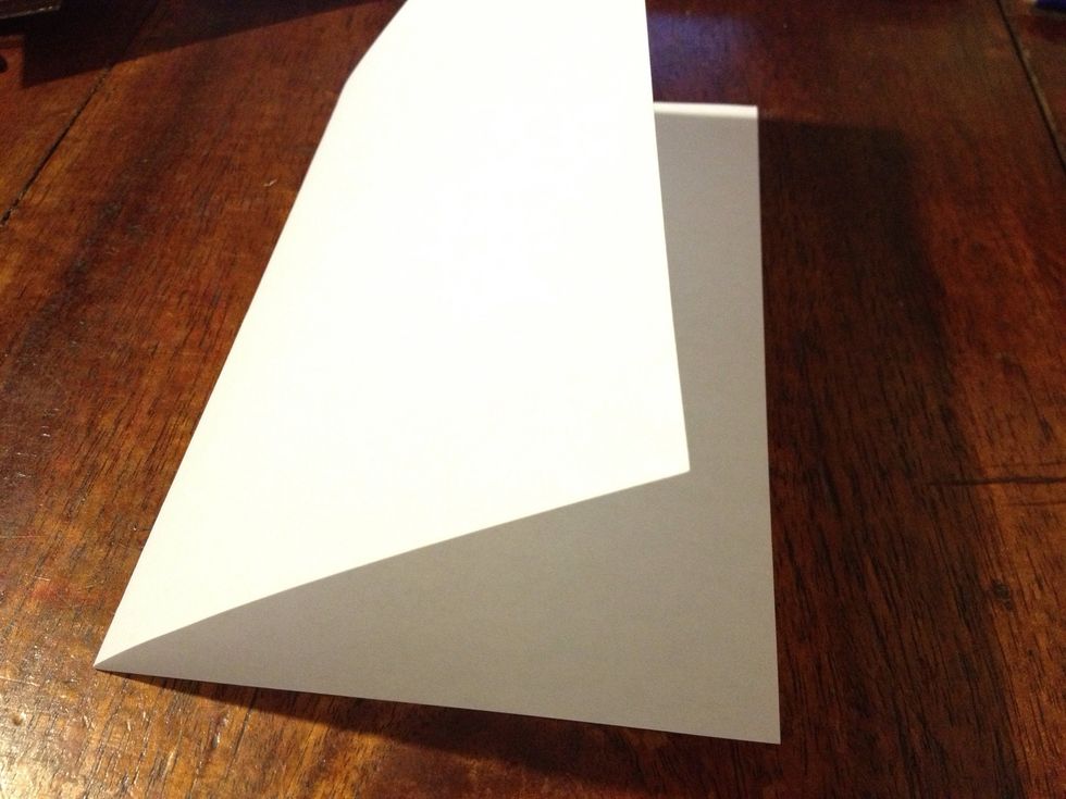 Fold another sheet of paper in half
