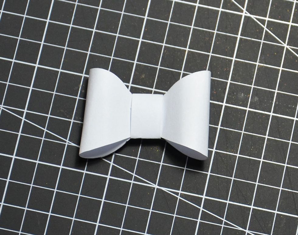 Fold around centre bow piece and glue.