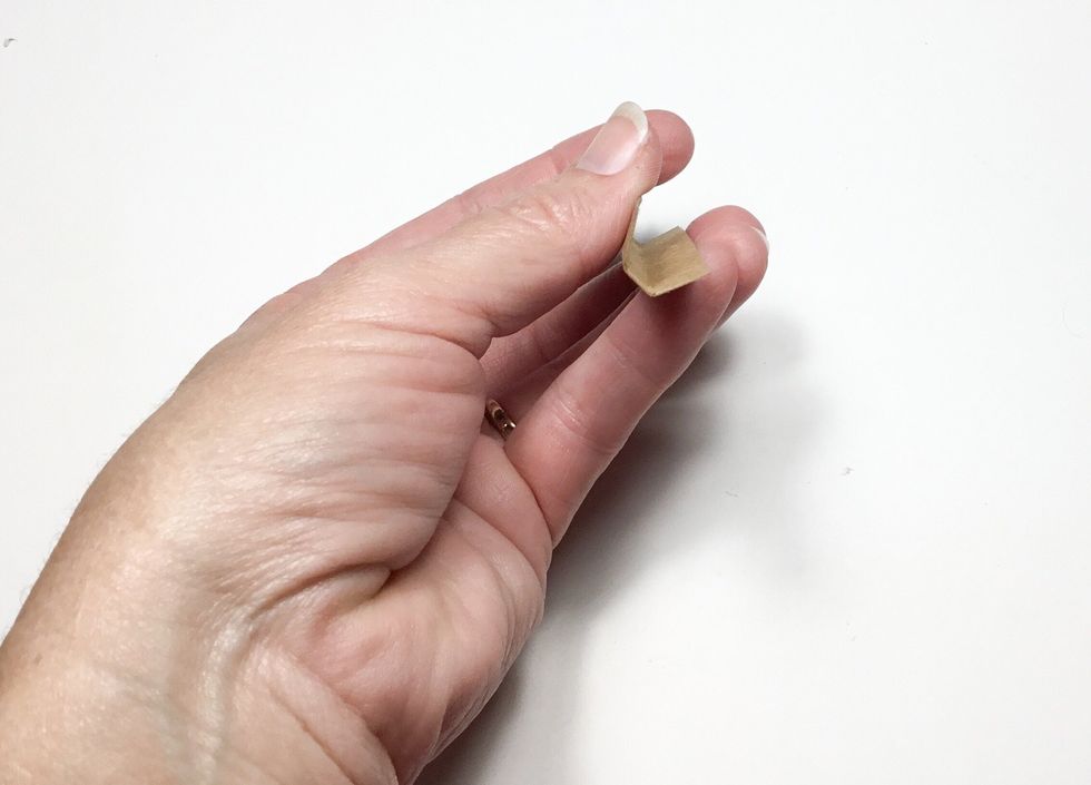 Fold as shown. These will become the folding spines for the inside album.