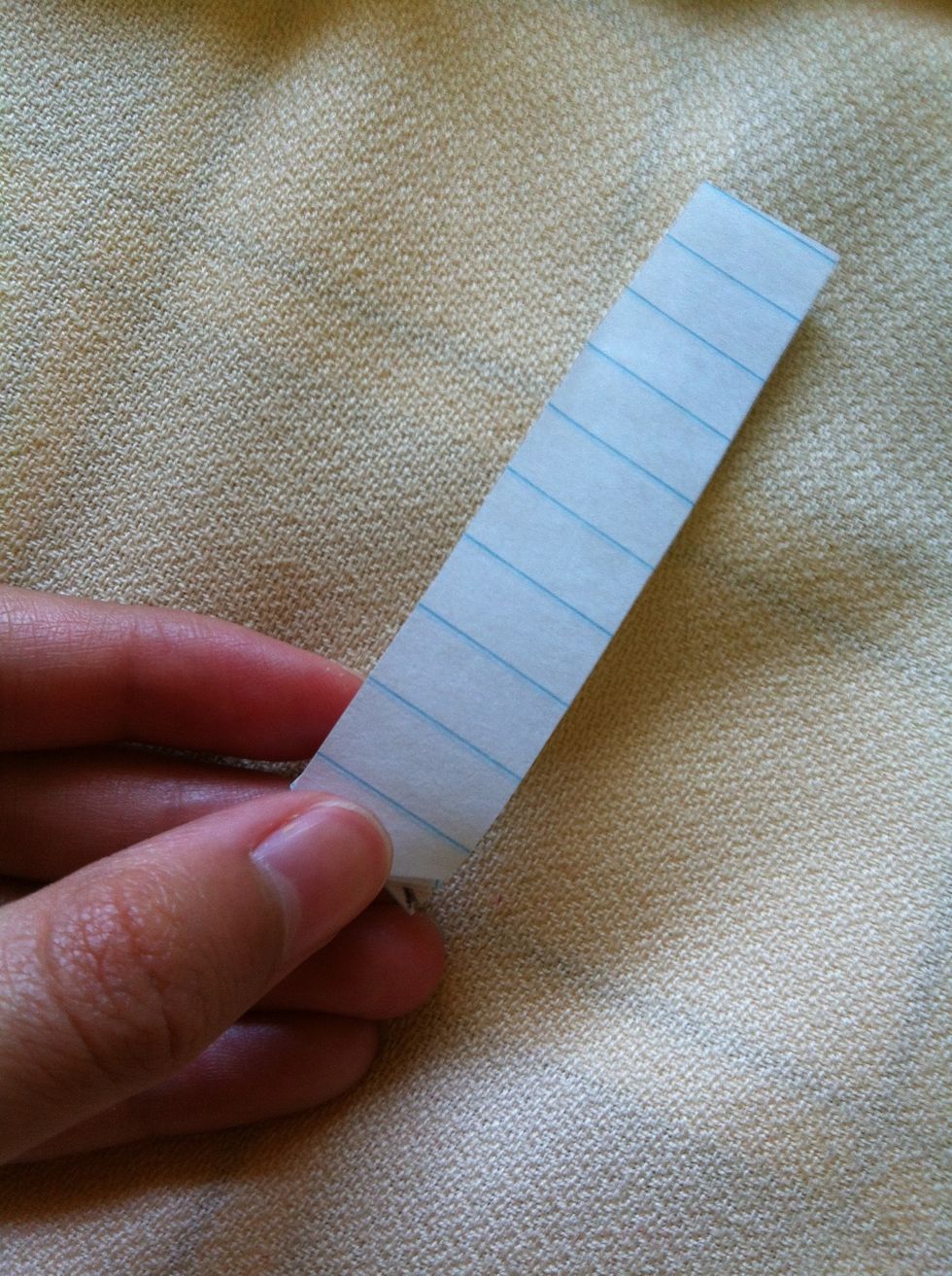 Fold at least 9 full triangles ( the first half one doesn't count) 10 if you're using glue instead of tape