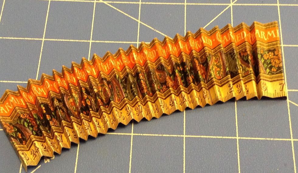 Fold back and forth, and assemble your floret. NOTE: Refer to my post "The Beautiful Floret" on the FotoBella Blog to see a step by step tutorial on how to assemble a Floret. blog.fotobella.com