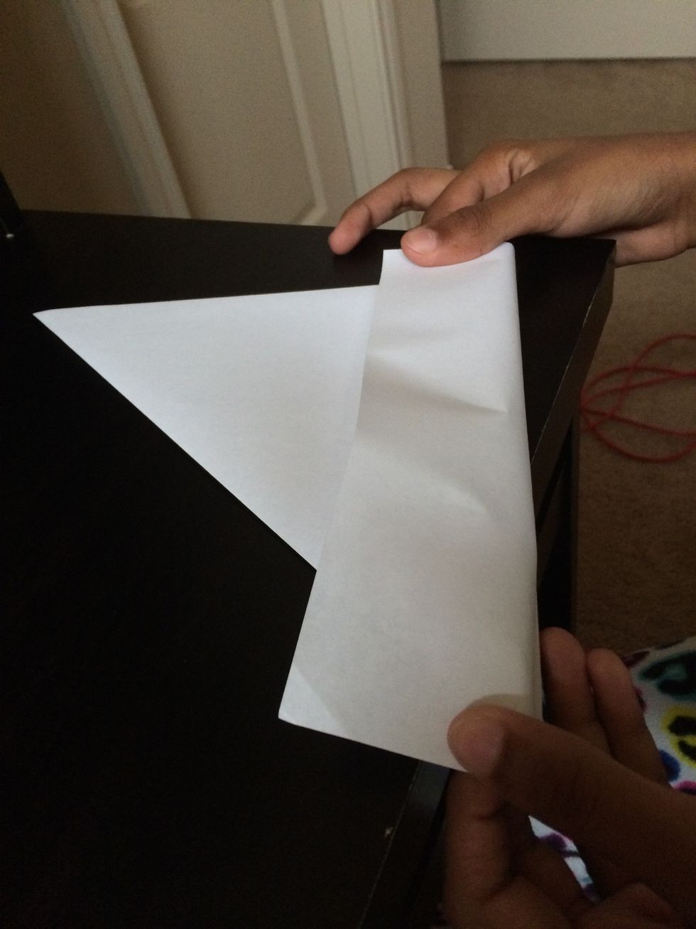 Fold back the access paper and crease it. Then rip the access paper. If you have scissors, then just cut off the access paper.