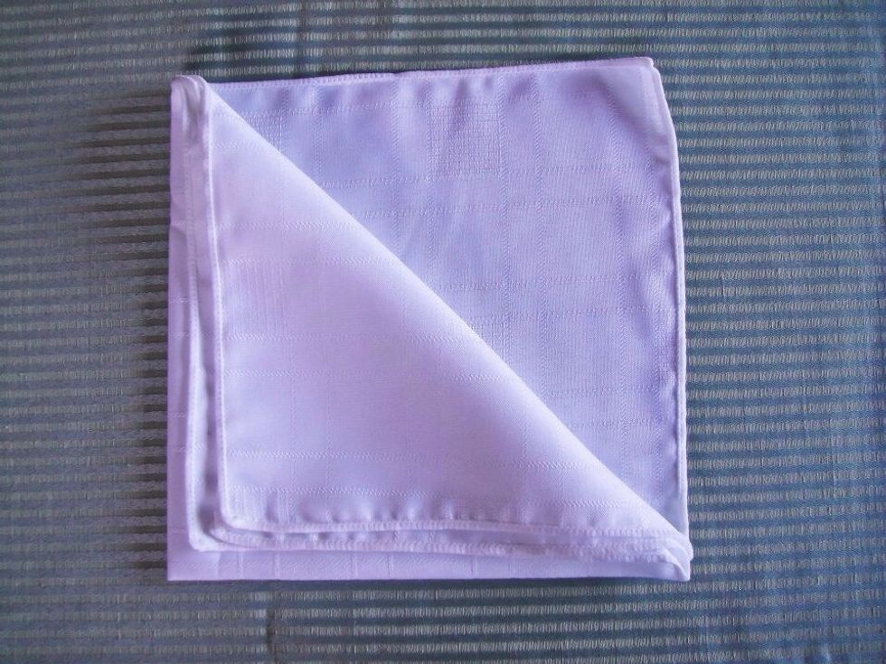 Fold back three layers to the left lower corner