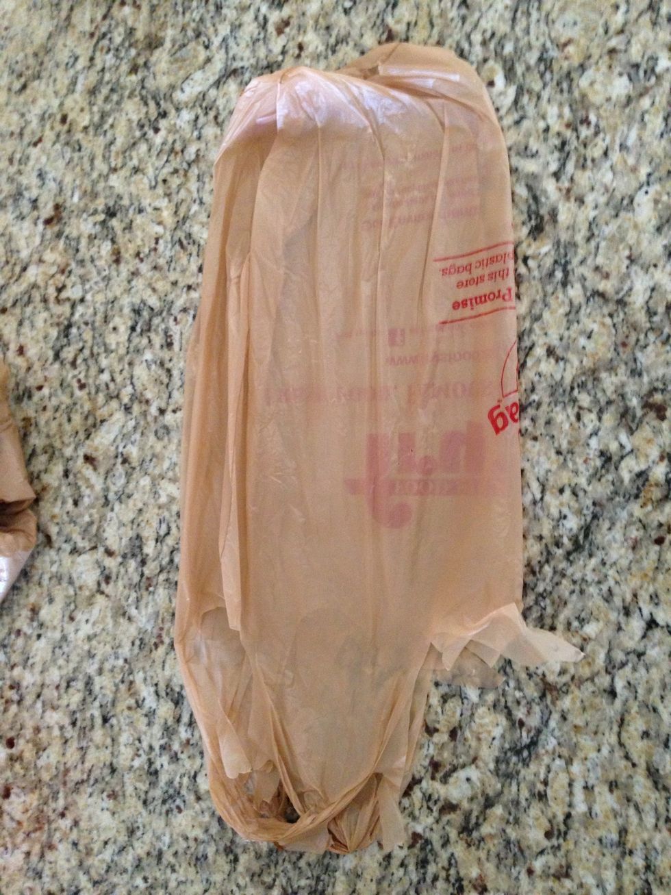 Fold bag in half.