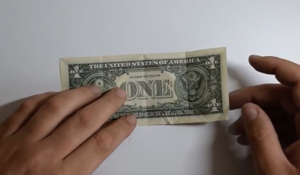 Fold bill in half