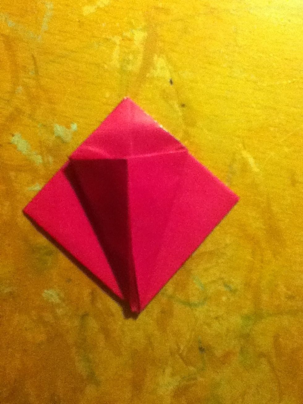 Fold both edges a little more than half way