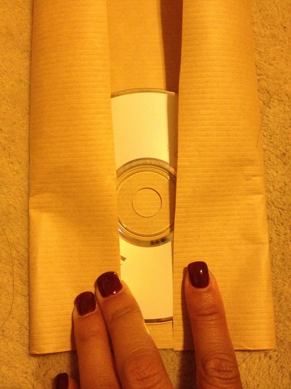 Fold both ends in over the CD