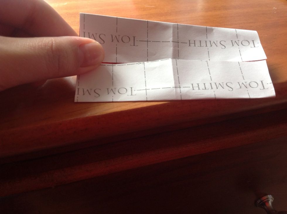 Fold both ends so it looks like the picture.