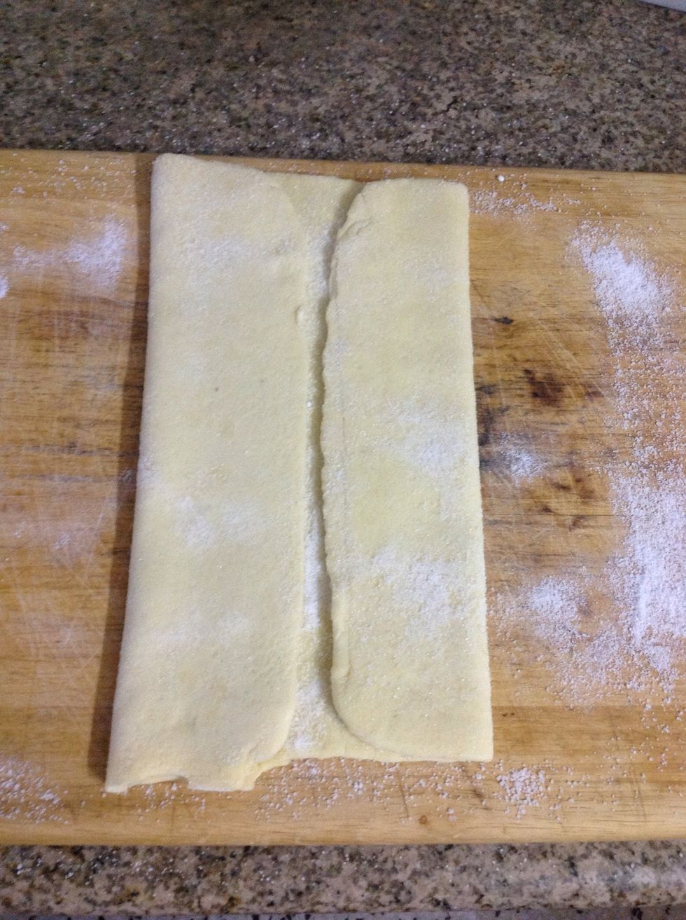 Fold both ends to the centre, but not all the way to the centre, leave a 1/4 inch gap.