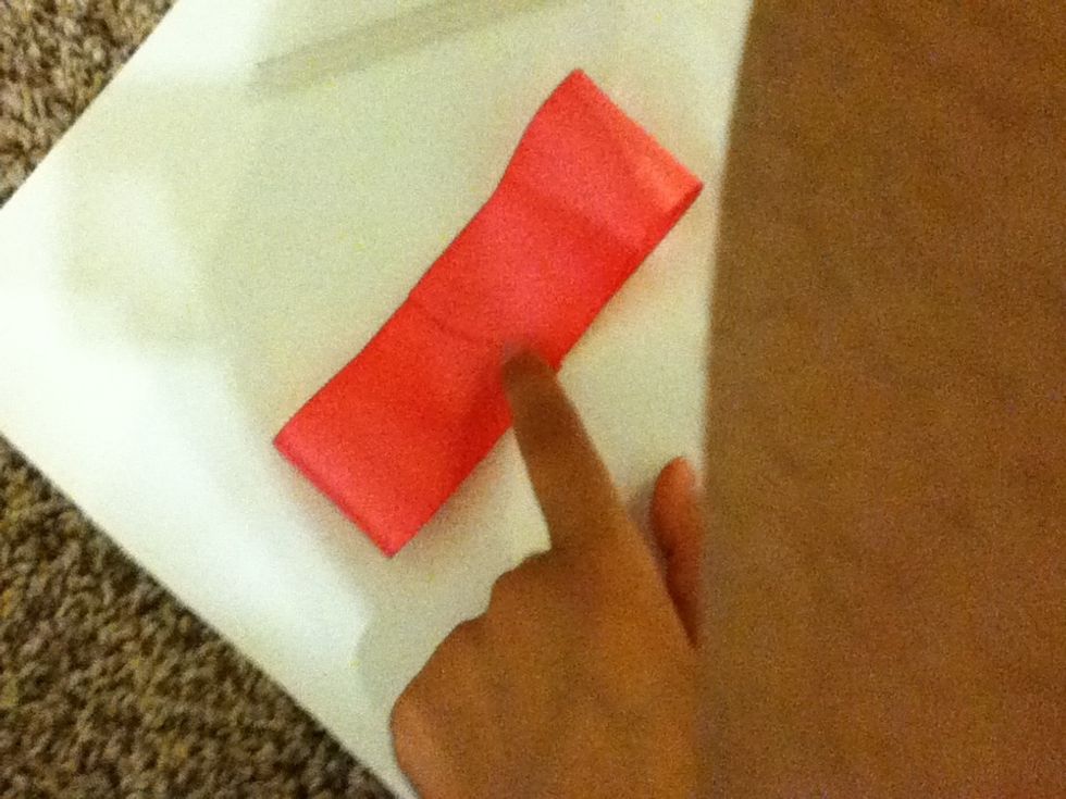 Fold both sides to meet in the middle