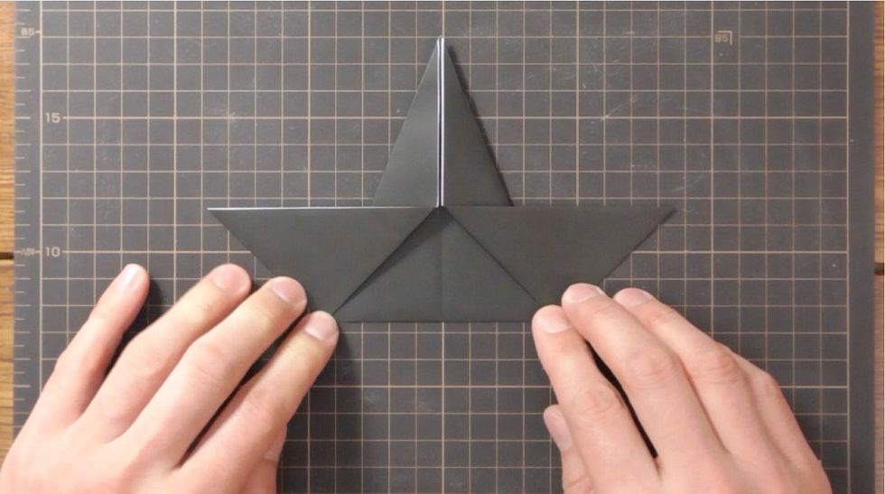 Fold bottom points out.