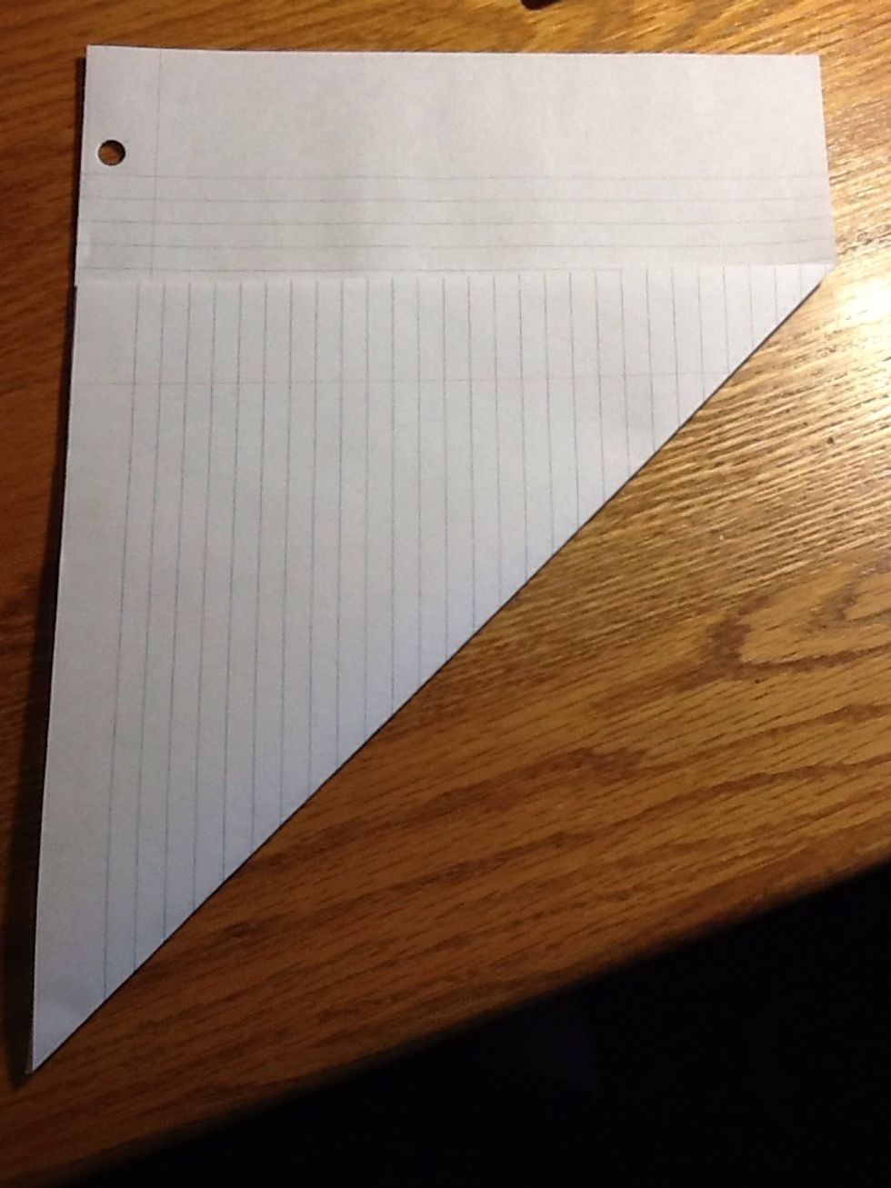 Fold bottom right corner up.