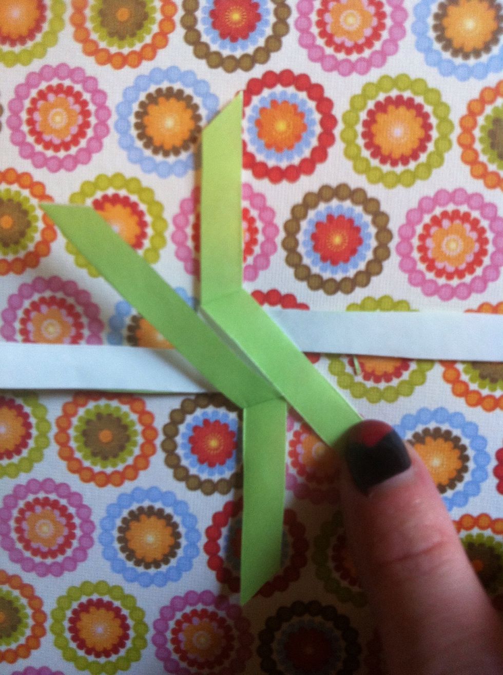 Fold bottom up diagonally.