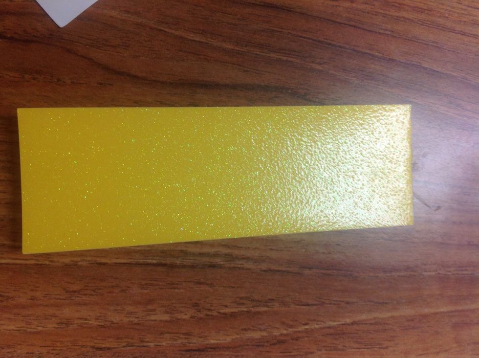 Fold card stock in half so magnets touch