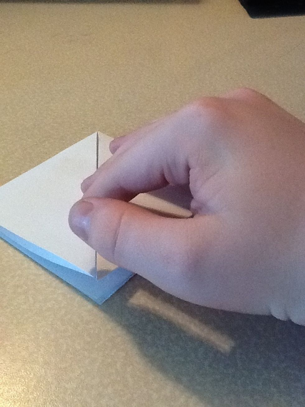 Fold corners down to middle